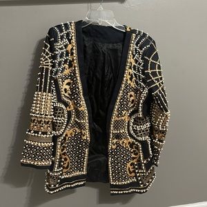 Brand new! Beautiful just didn’t fit and I waited too long to return it.